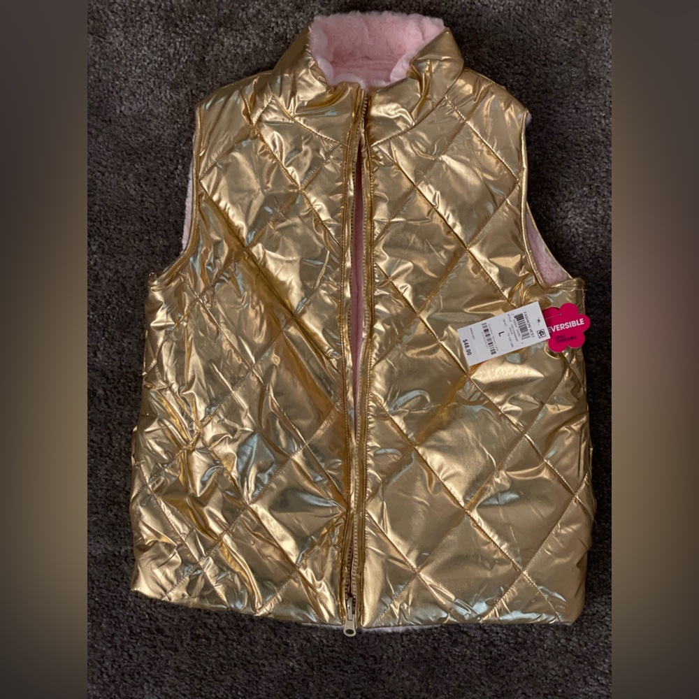 Girls reversible winter vest. New with tags! Size 12